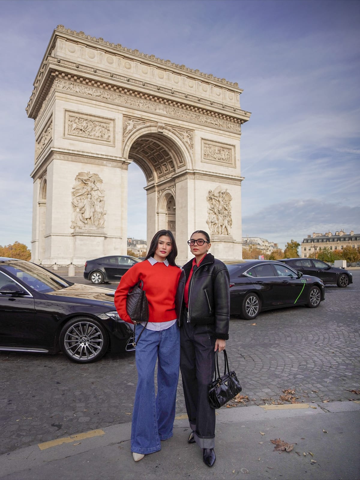Jen Barangan and Ashley Ortega at the Arc de Triomphe in Paris with Avian