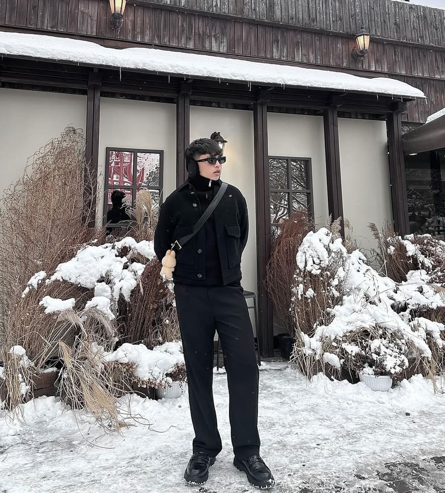 Jayson Ventura in the snow in South Korea, travelling with Avian Summit Travel