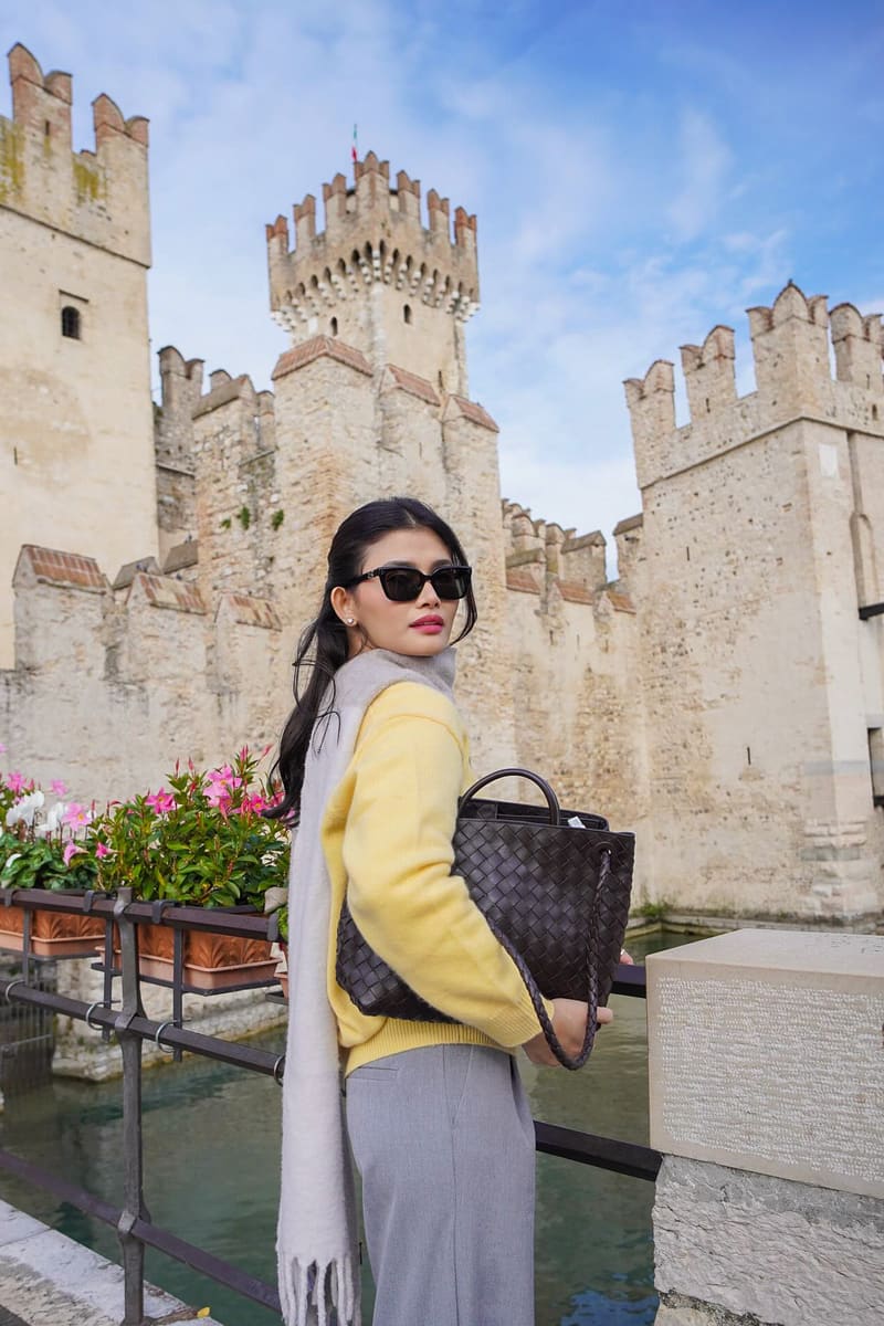Jen Barangan at Scaliger Castle in Sirmione, Italy, travelling with Avian Summit Travel
